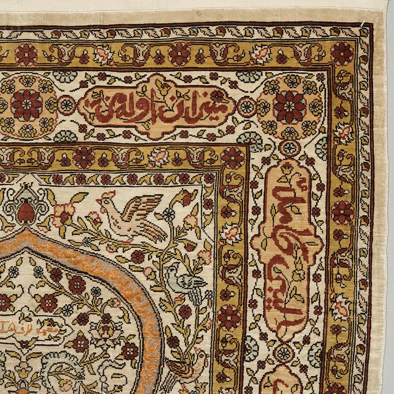A silk Hereke possibly, around 96 x 66 cm.