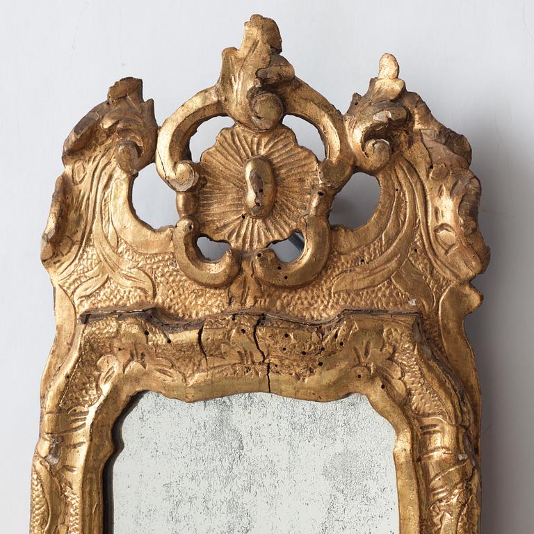 A pair of Italien 18th/19th Century one-light girandole mirrors.