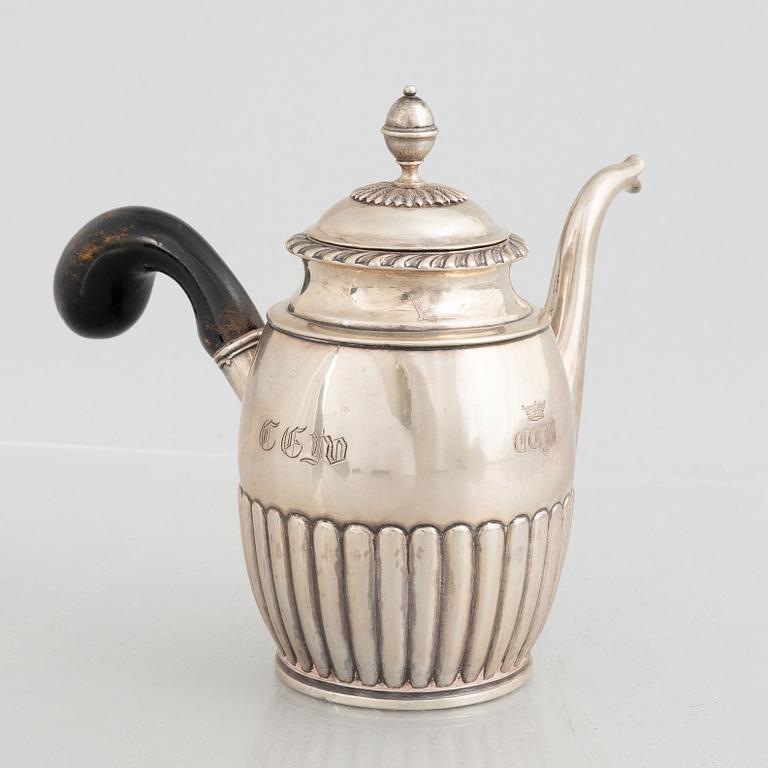 A Swedish Empire silver coffee pot, mark of Gustaf Folcker, Stockholm 1830.