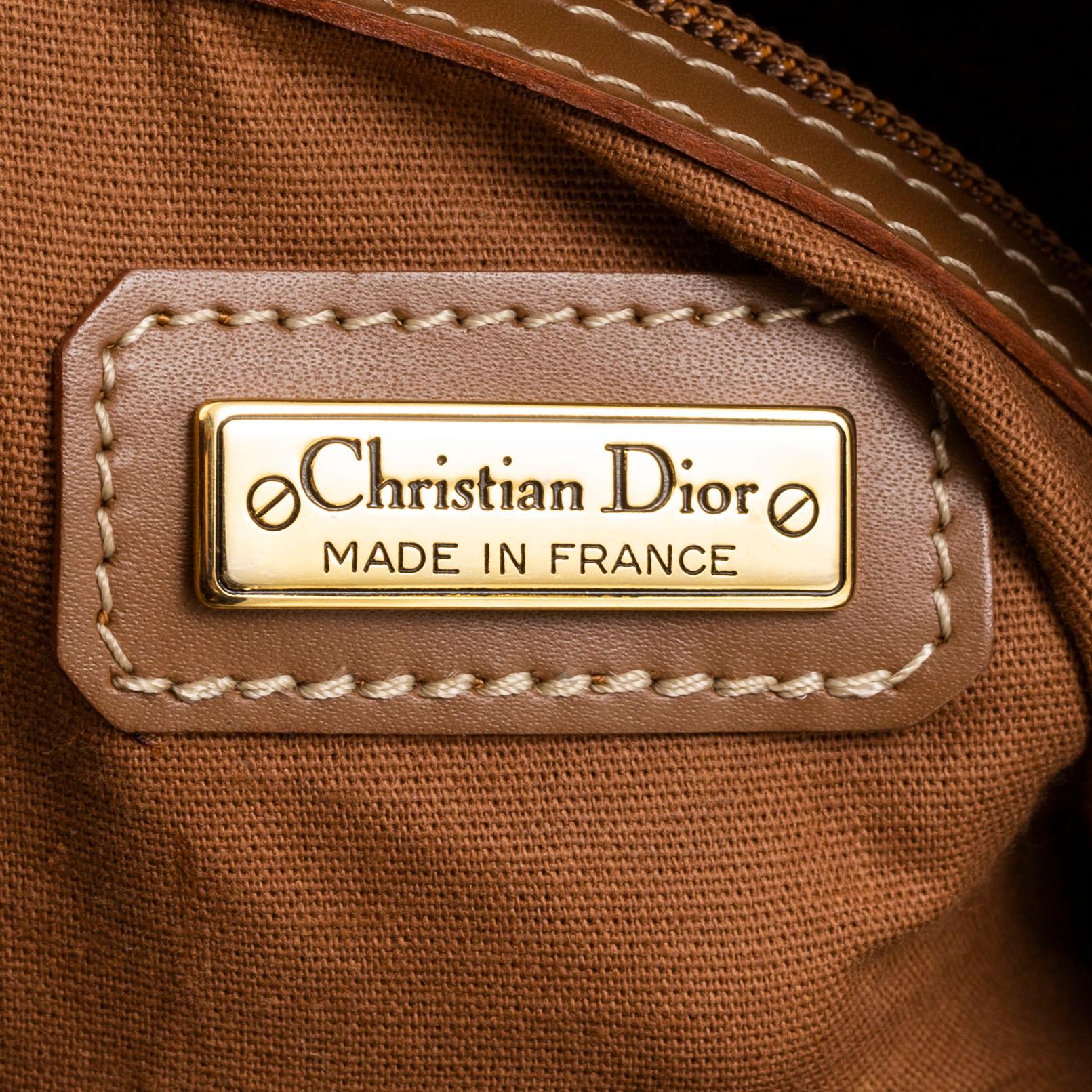 CHRISTIAN DIOR, a canvas and leather weekendbag.