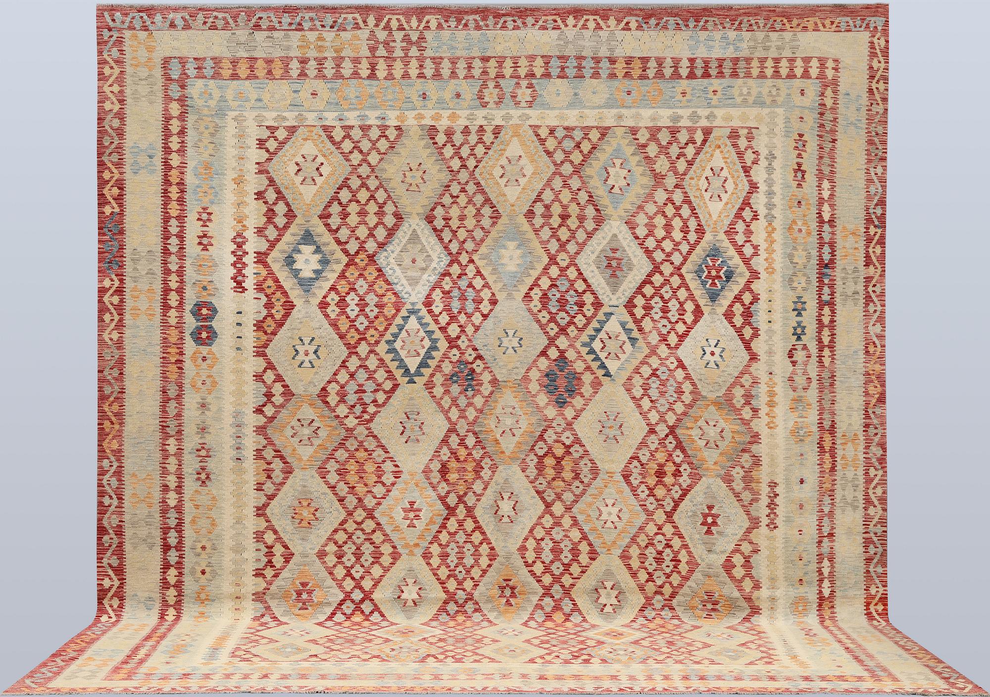 A Kilim carpet, approx. 433 x 369 cm.