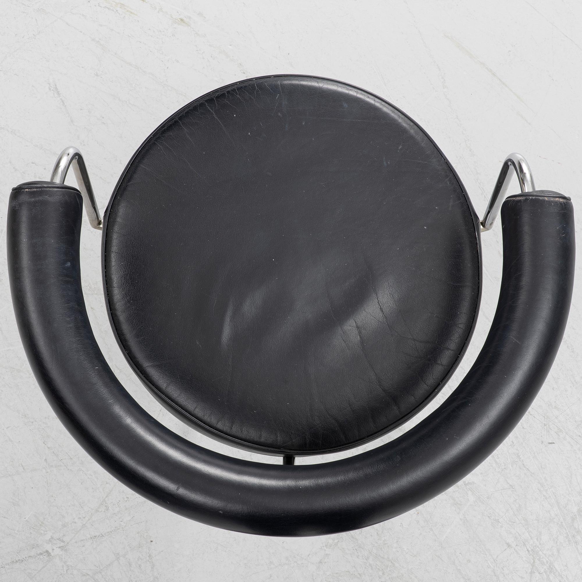 Charlotte Perriand, /Le Corbusier, swivel armchairs, a pair, model LC7, Cassina, Italy, later part of the 20th century.