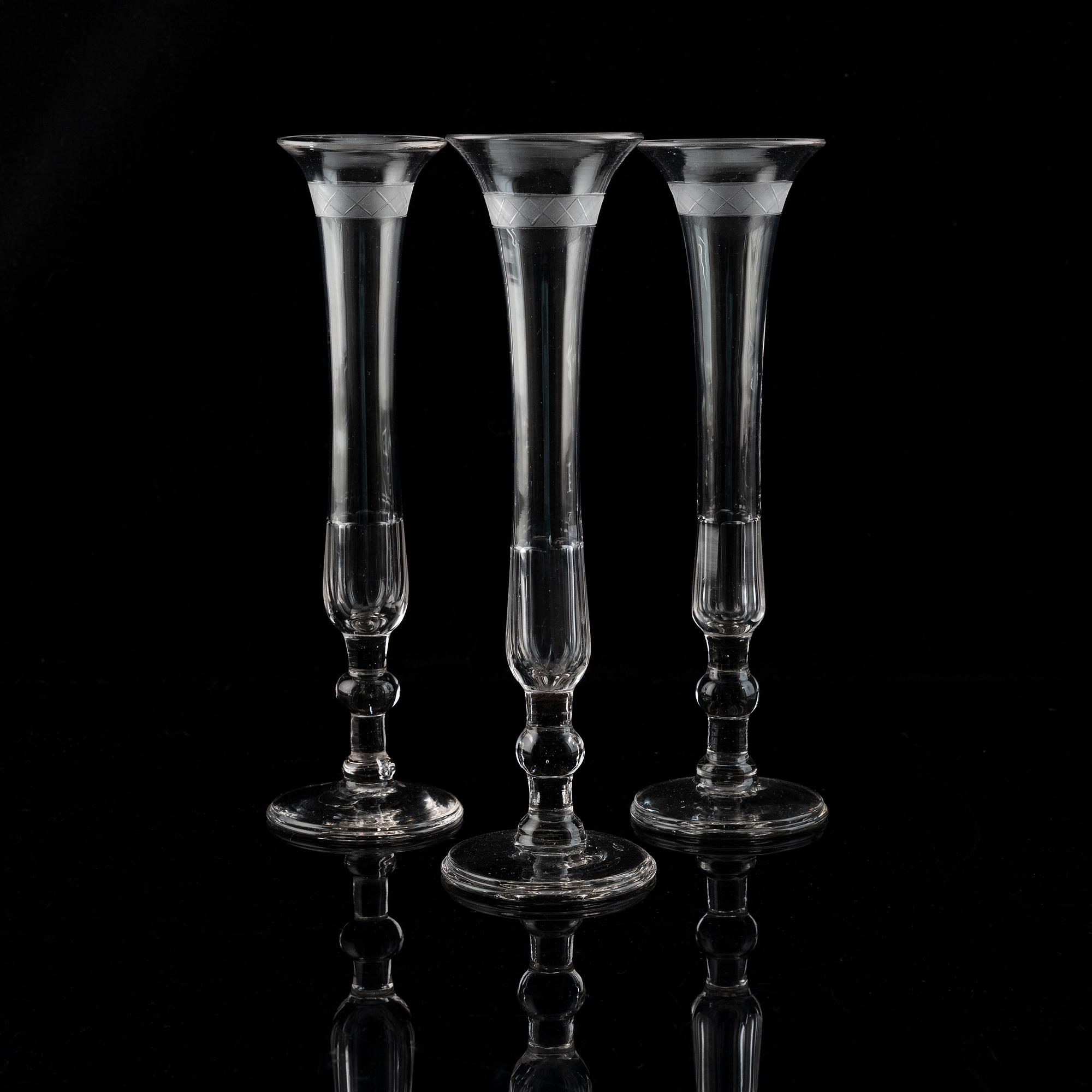 A set of nine early 19th century champagne flutes.