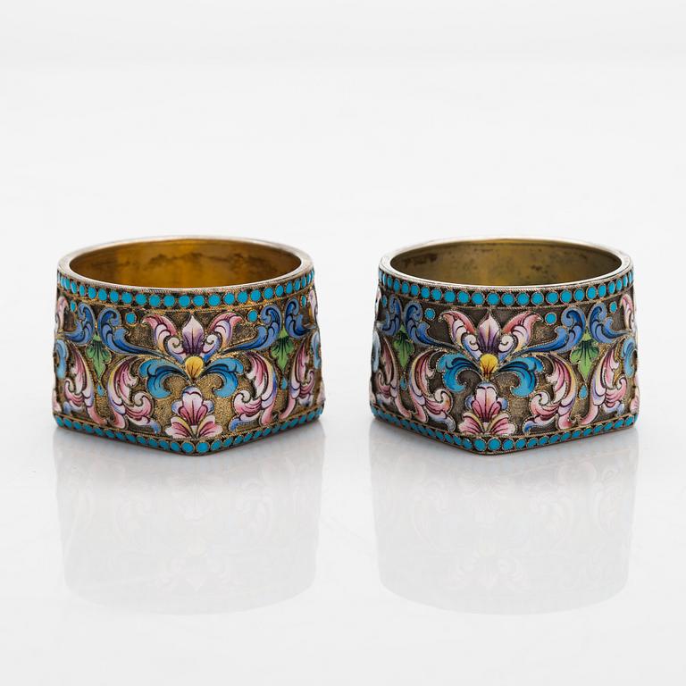 A pair of cloisonné enamel and gilt silver salt cellars, Cyrillic maker's mark F.P, Moscow 1908-26.