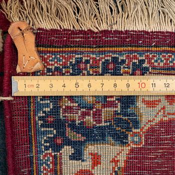 A semi-antique pictoral Kashan rug, Central Persia, c. 219 x 137 cm.