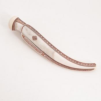 A reindeer horn knife by Olav Svonni, signed and dated 2000.