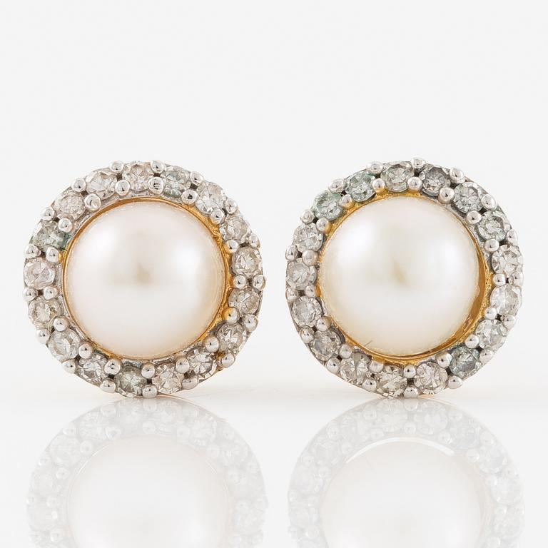 Earrings, a pair, 18K gold with pearls and small diamonds.