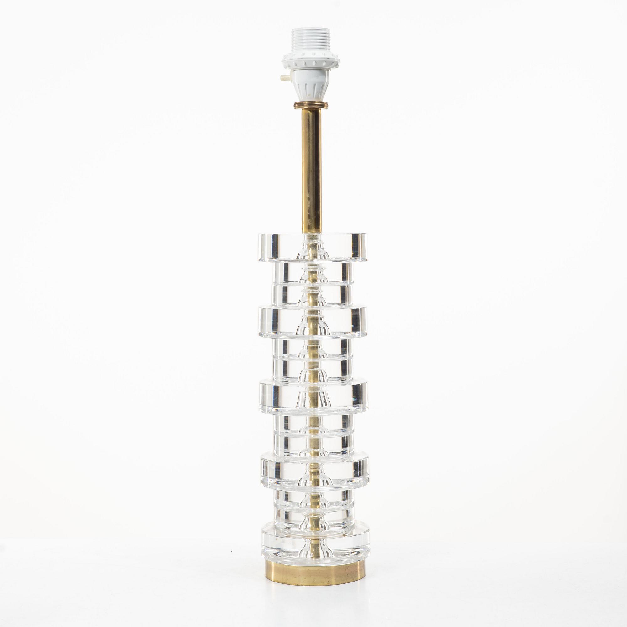 Carl Fagerlund, A table lamp in glass and brass, Orrefors.