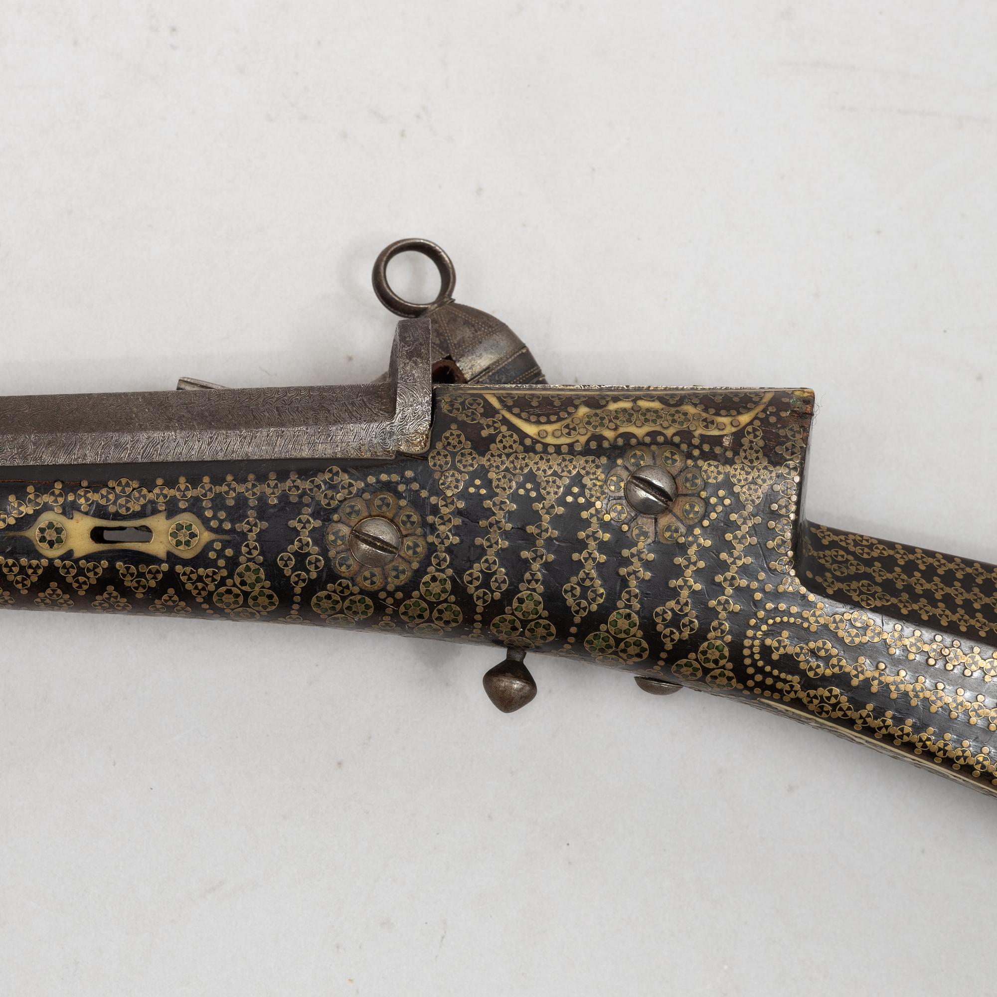 A Persian snaphaunce rifle, 18th century.