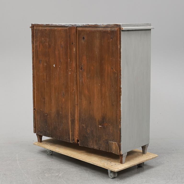 A mid 19th Century painted cupboard.