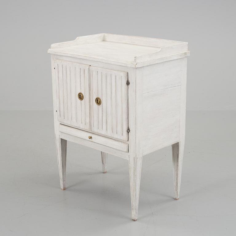 An early 19th century bedside table.