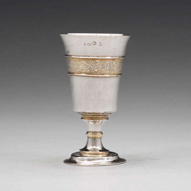 An English mid 16th century parcel-gilt communion cup, mark of Robert Danbe/Daube, London 1562.