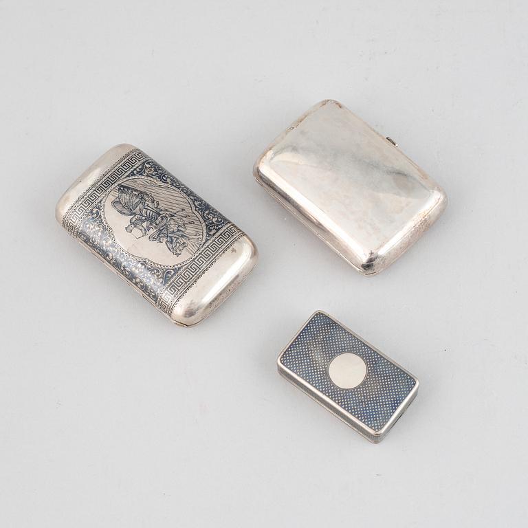 Two Russian 19th century silver and niello boxes and a silver purse, Moscow and St. Petersburg.