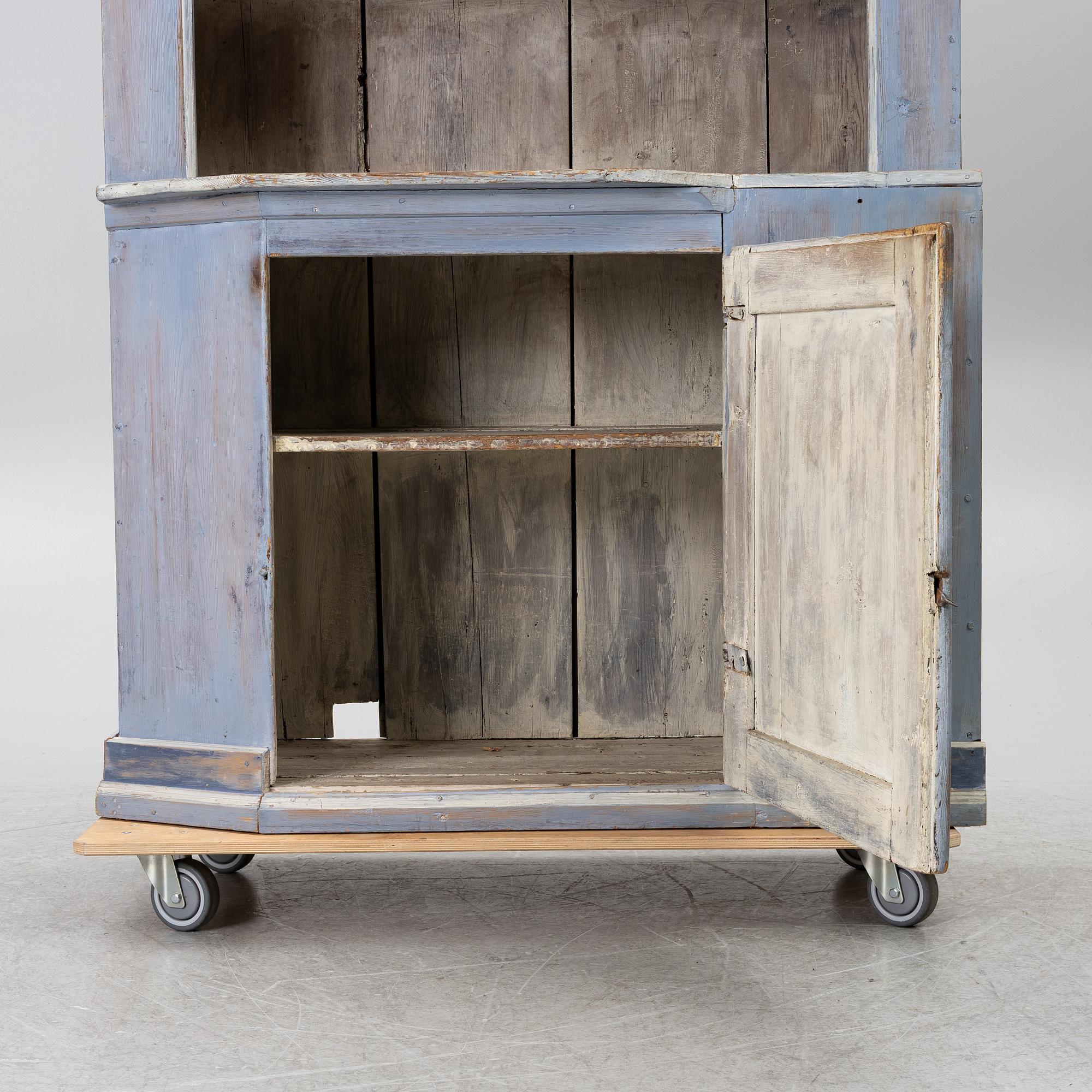 A painted folk-art cupboard, early 19th century.