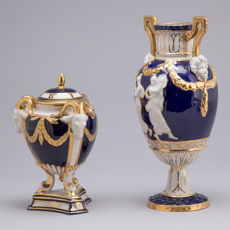 A ROYAL DUX PORCELAIN VASE AND LIDDED URN, 20th century.