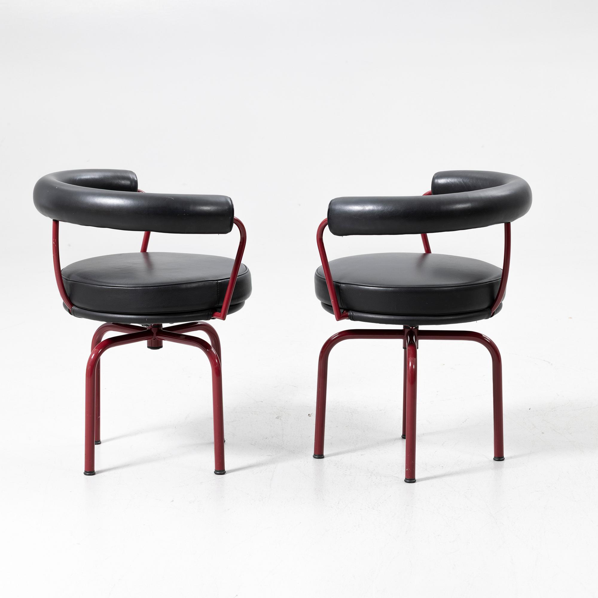 Charlotte Perriand, /Le Corbusier, swivel armchairs, a pair, model LC7, Cassina, Italy, latter half of the 20th century.