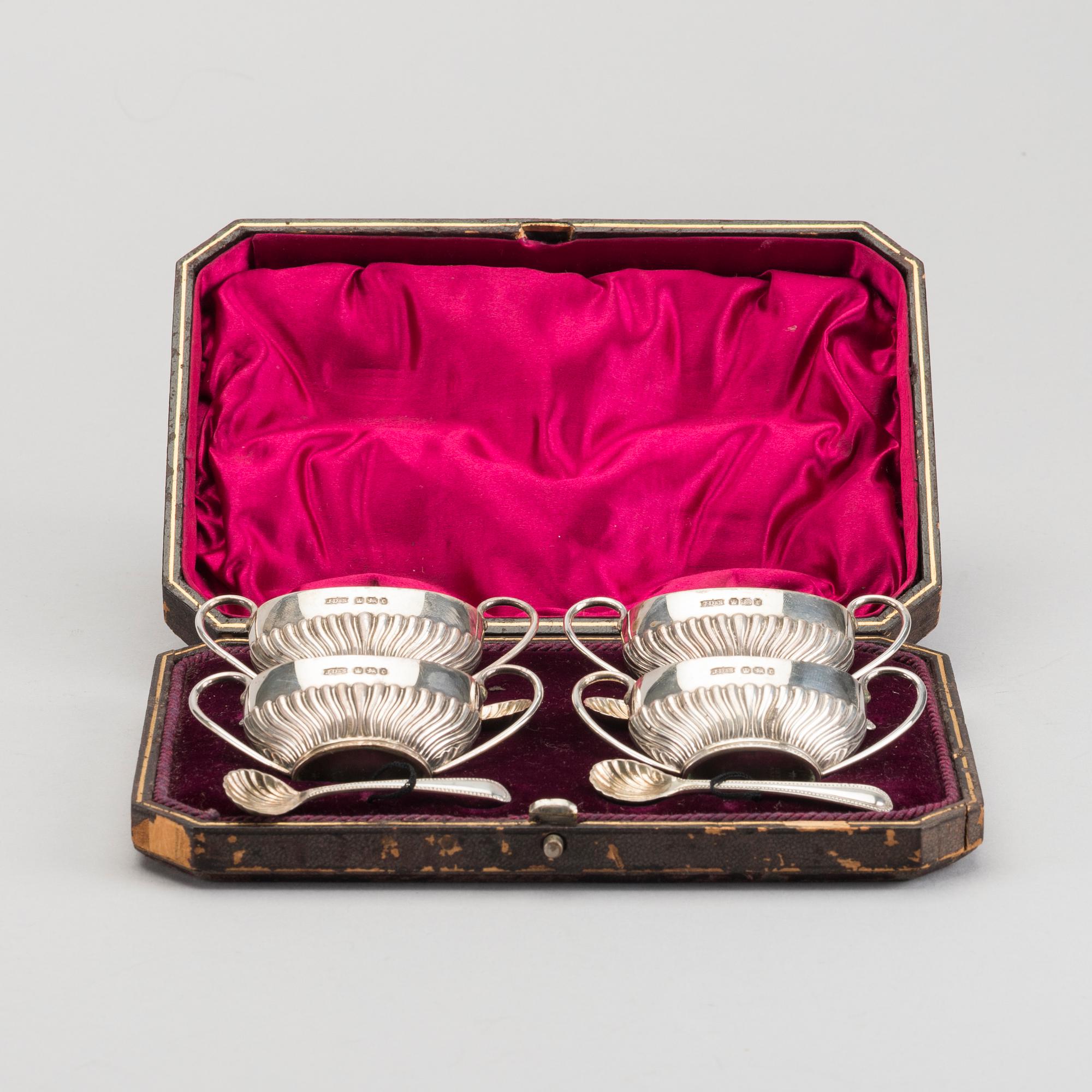 An English set of four silver salters with spoons mark of James Dixon & sons Sheffield 1895, weight 166 gr.