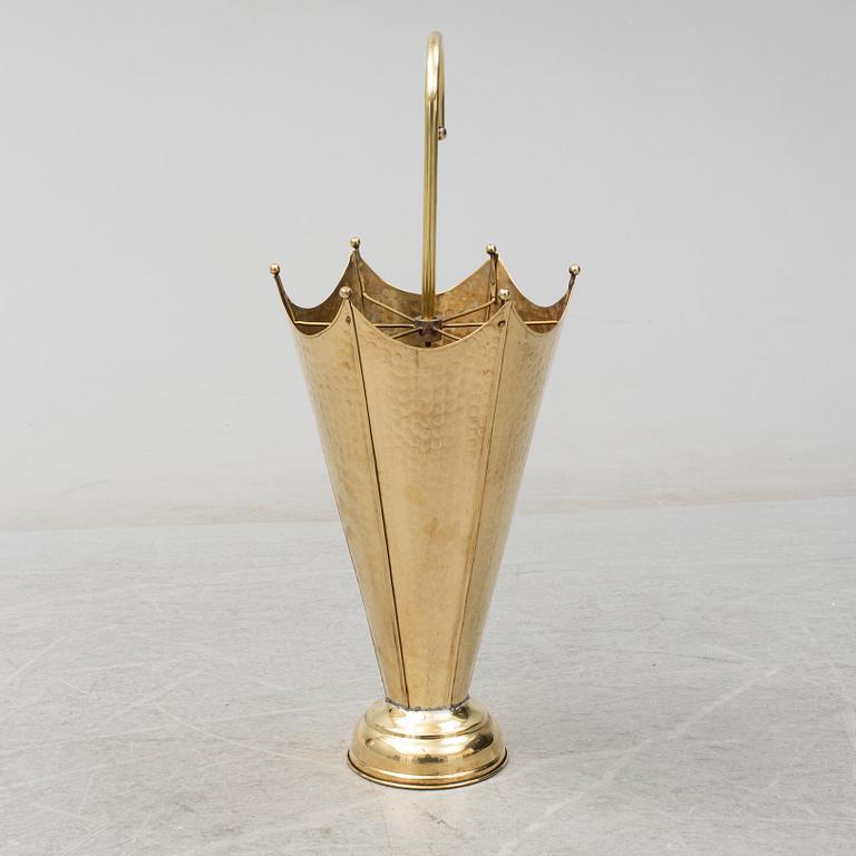 A brass umbrella stand.