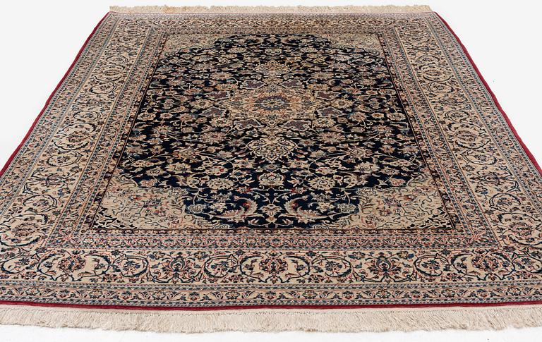 A semi-antique Nain Tudeshk carpet, c. 307 x 206 cm.