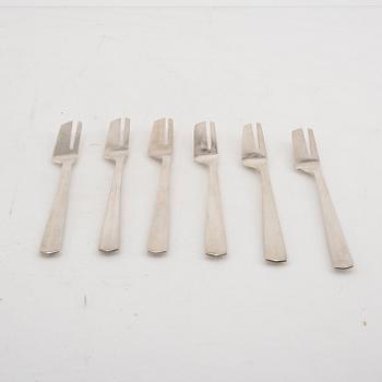 A Swedish 20th century set of 12 silver cake forks mark of Anders Ericson Kristianstad 1969 weight 390 grams.