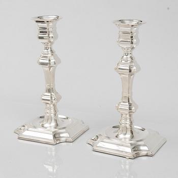 Pedro Duran, a pair of Baroque style sterling silver candle sticks, Spain.