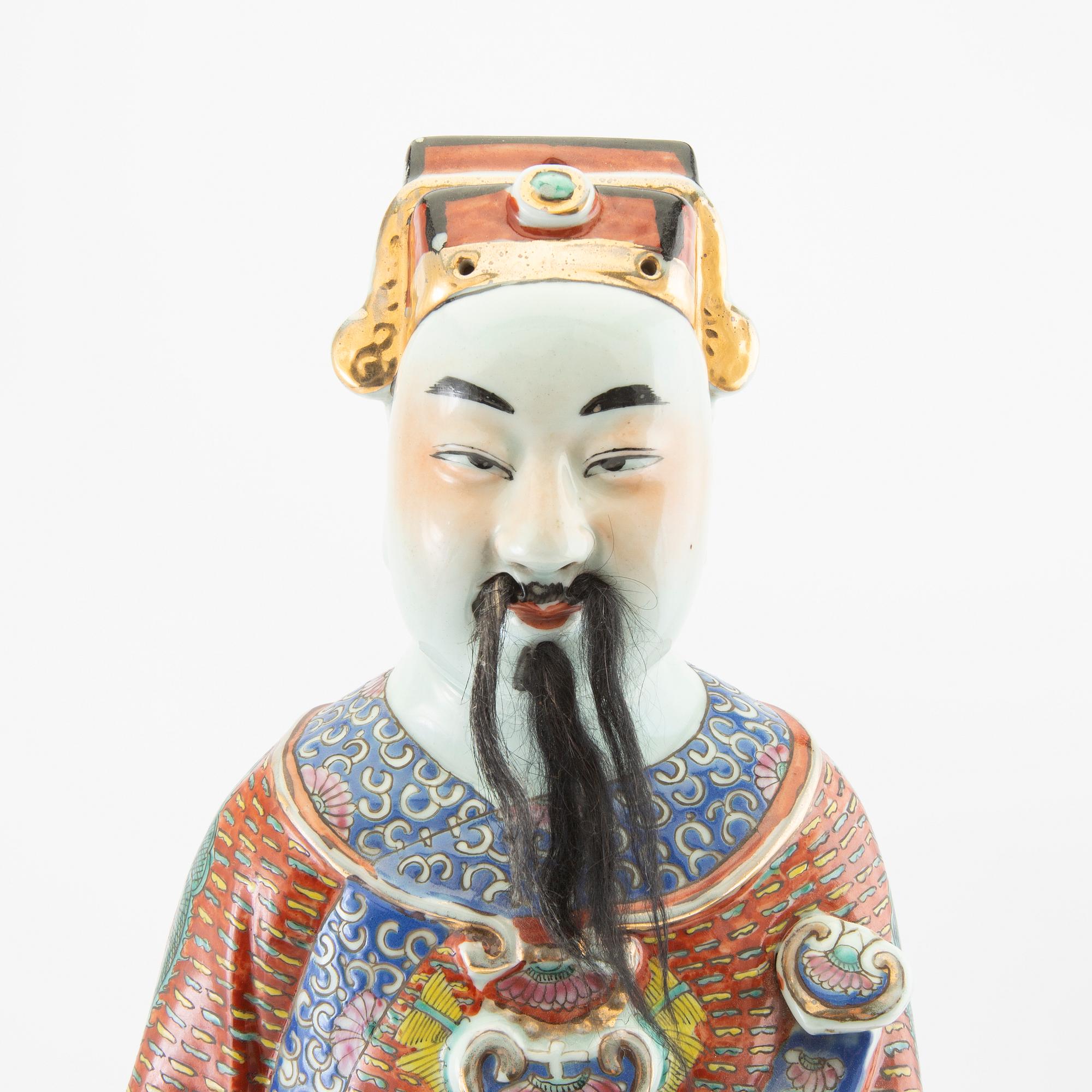 A Chinese porcelain figure, 20th century.