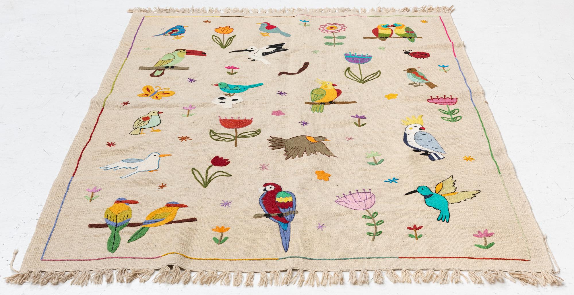 A hand-embroidered Kelim carpet, c. 200 x 145 cm.