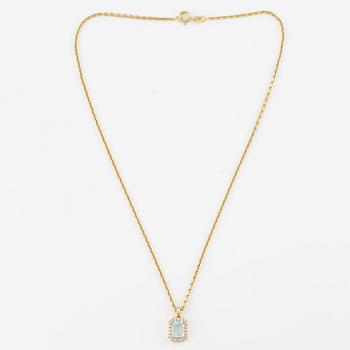 Pendant with 14K gold chain with a faceted aquamarine and round brilliant-cut diamonds.