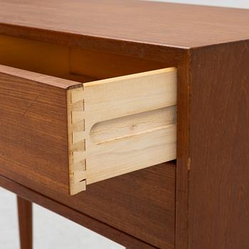 Kai Kristiansen, a teak veneered chest of drawers, Feldballes, Denmark, mid 20th century.