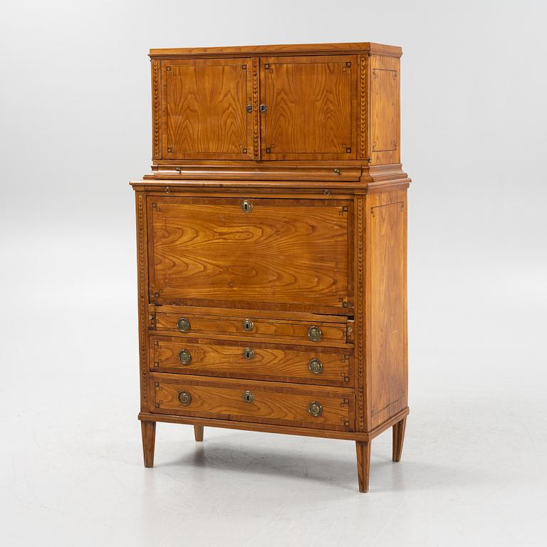 A French elm veneered secretaire, 19th Century.