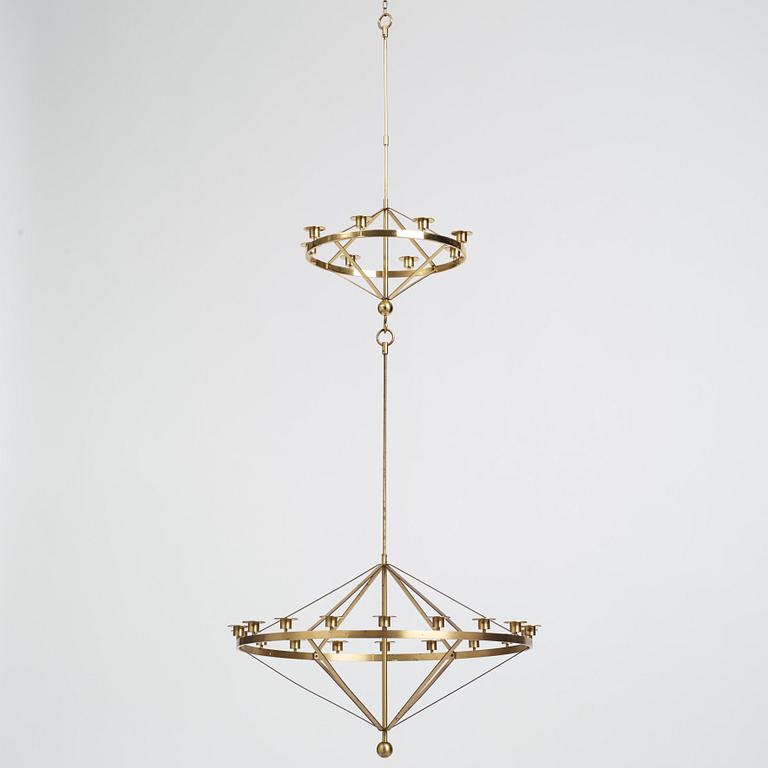 Sigurd Persson, two brass chandeliers, one for 18, the smaller for 8 candles Sweden, probably 1960s.