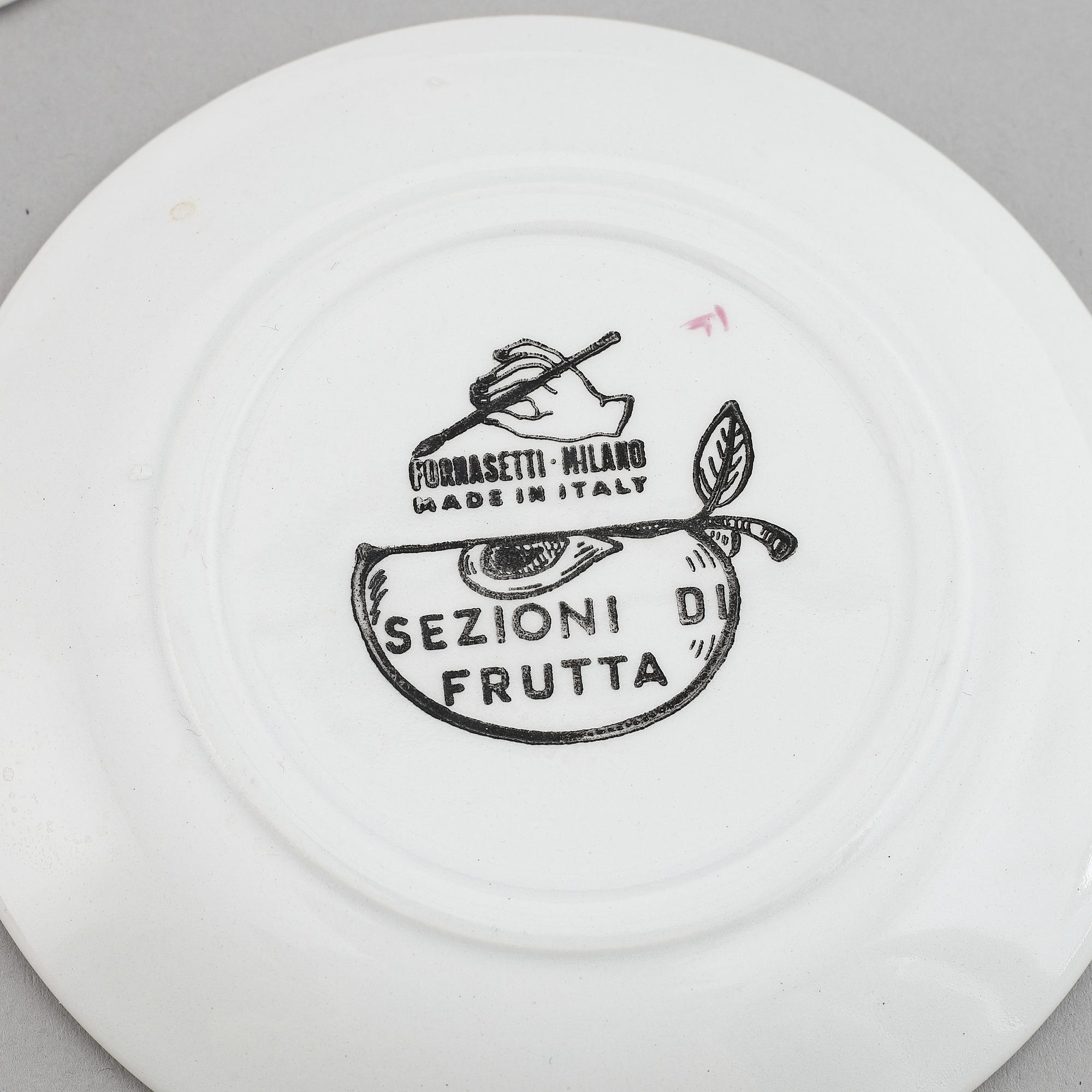 Piero Fornasetti, eight ceramic coasters, Milan, Italy.
