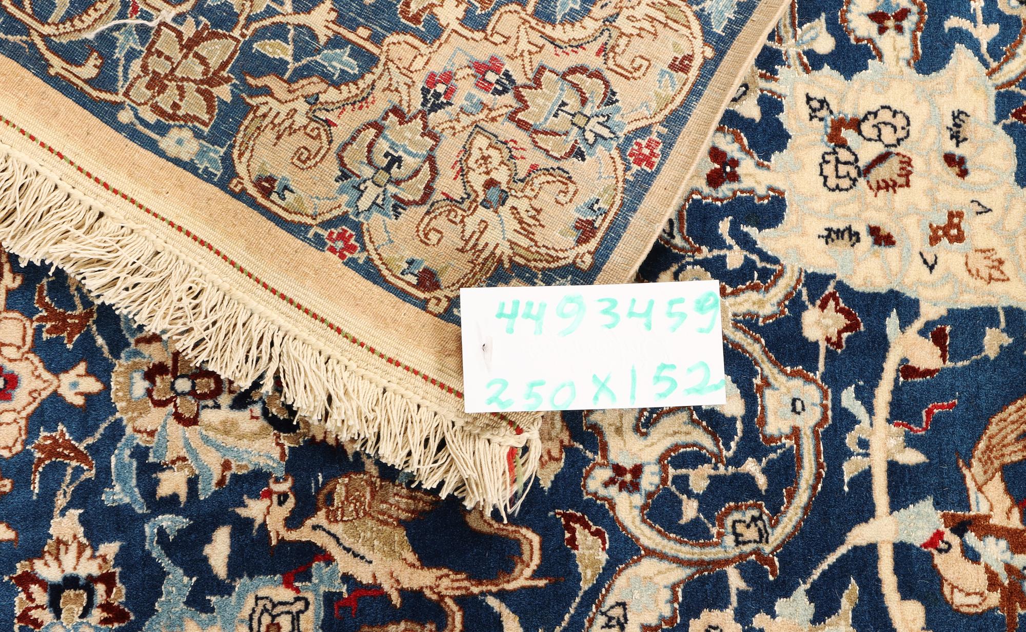 A part silk Nain carpet, 6 LA, c. 250 x 152 cm.