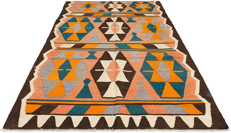 A Persian Nomad Kilim runner, approx. 313 x 162 cm.