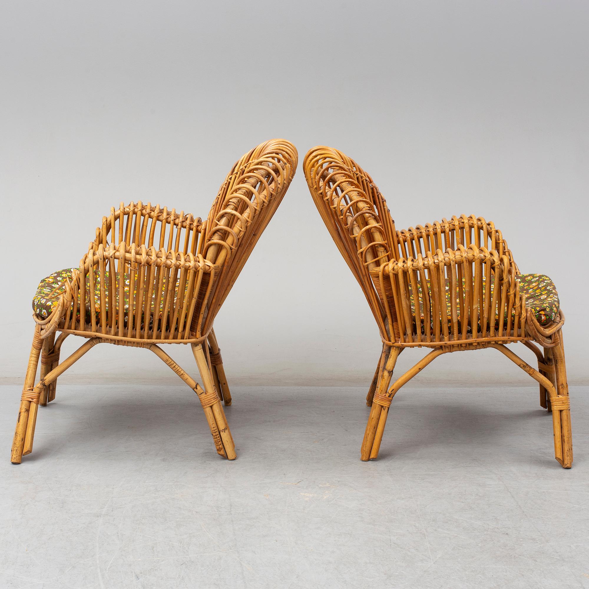 A pair of rattan armchairs, Emilio Paoli, via Vigna Nuova, 8, Firenze, Italy, second half of the 20th century. Signed.