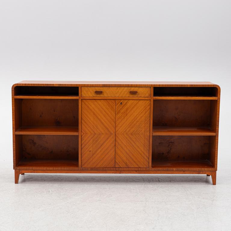 A ahogany-veneered 1940's/50's bookcase.