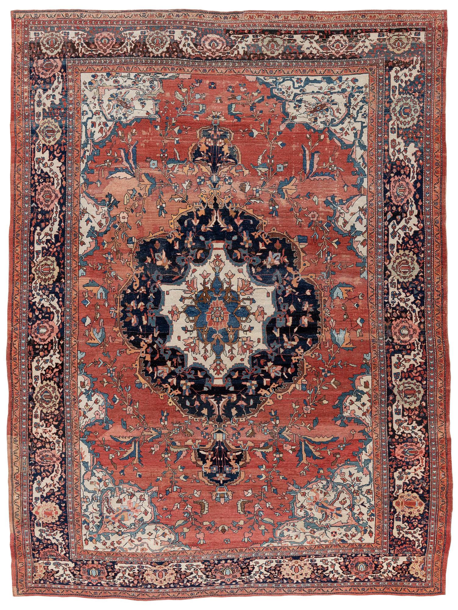 An Antique Sarouk carpet, West Persia, c. 353 x 260 cm.