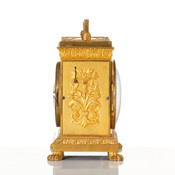 A late empire mantel clock, mid 19th century.