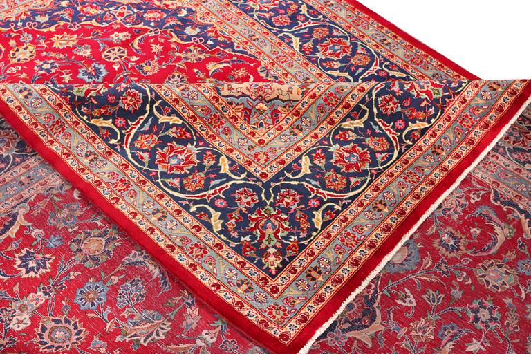 A Keshan carpet, c. 408 x 295 cm.