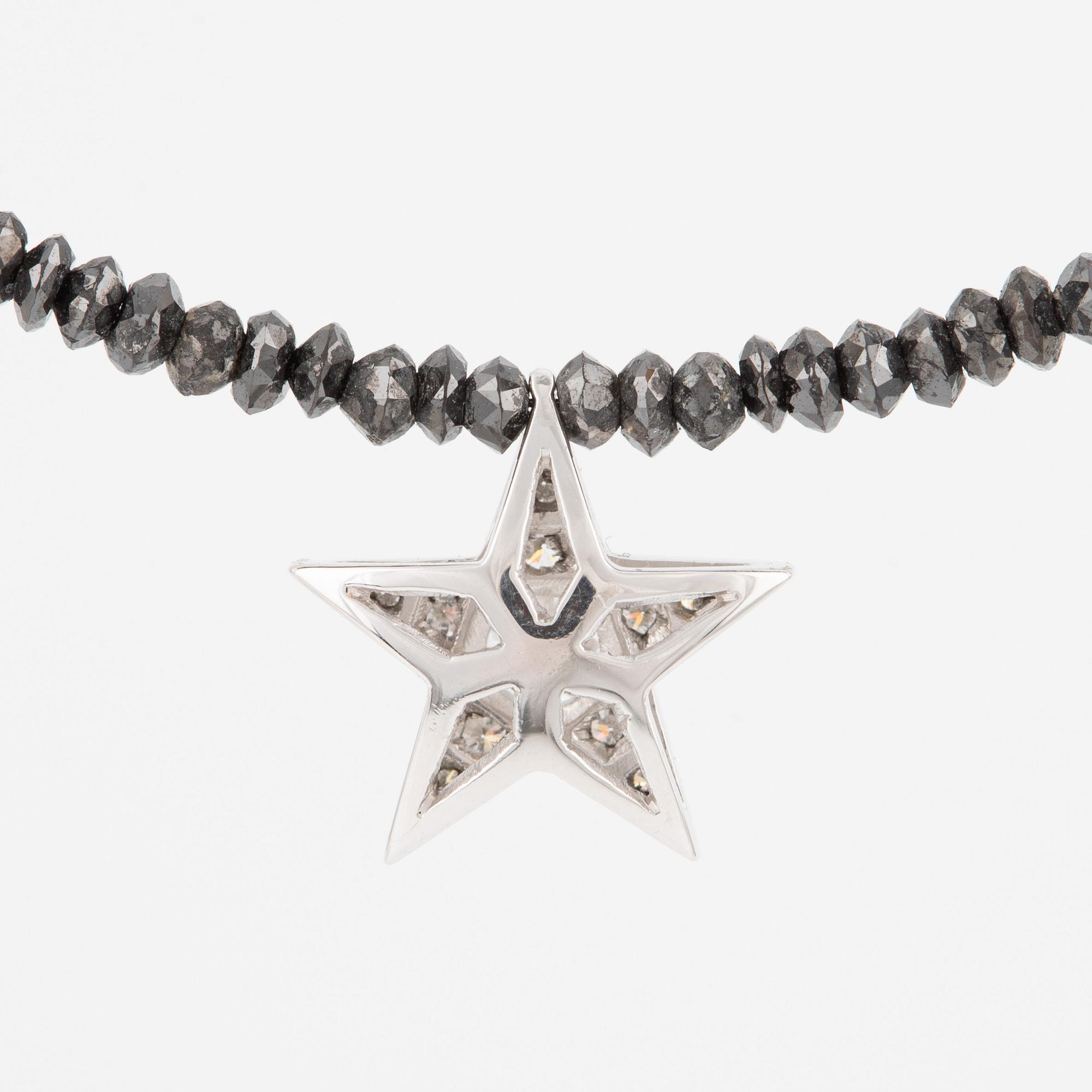 Necklace, Atelier Ajour, black diamonds with a star pendant set with brilliant-cut diamonds.