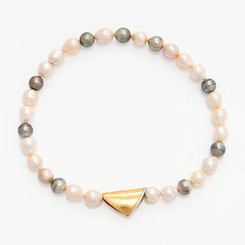 Ole Lynggaard, A cultured pearl necklace, clasp in 18K gold with a round brilliant-cut diamond.