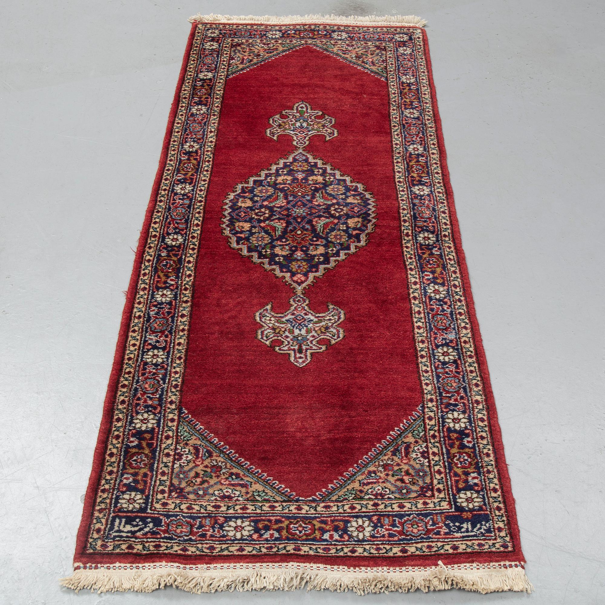 A runner, Tabriz probably, signed, ca 193 x 70 cm.