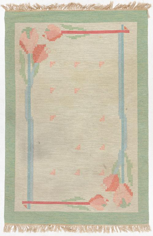 A flat weave carpet, signed PIA, c. 244 x 163 cm.