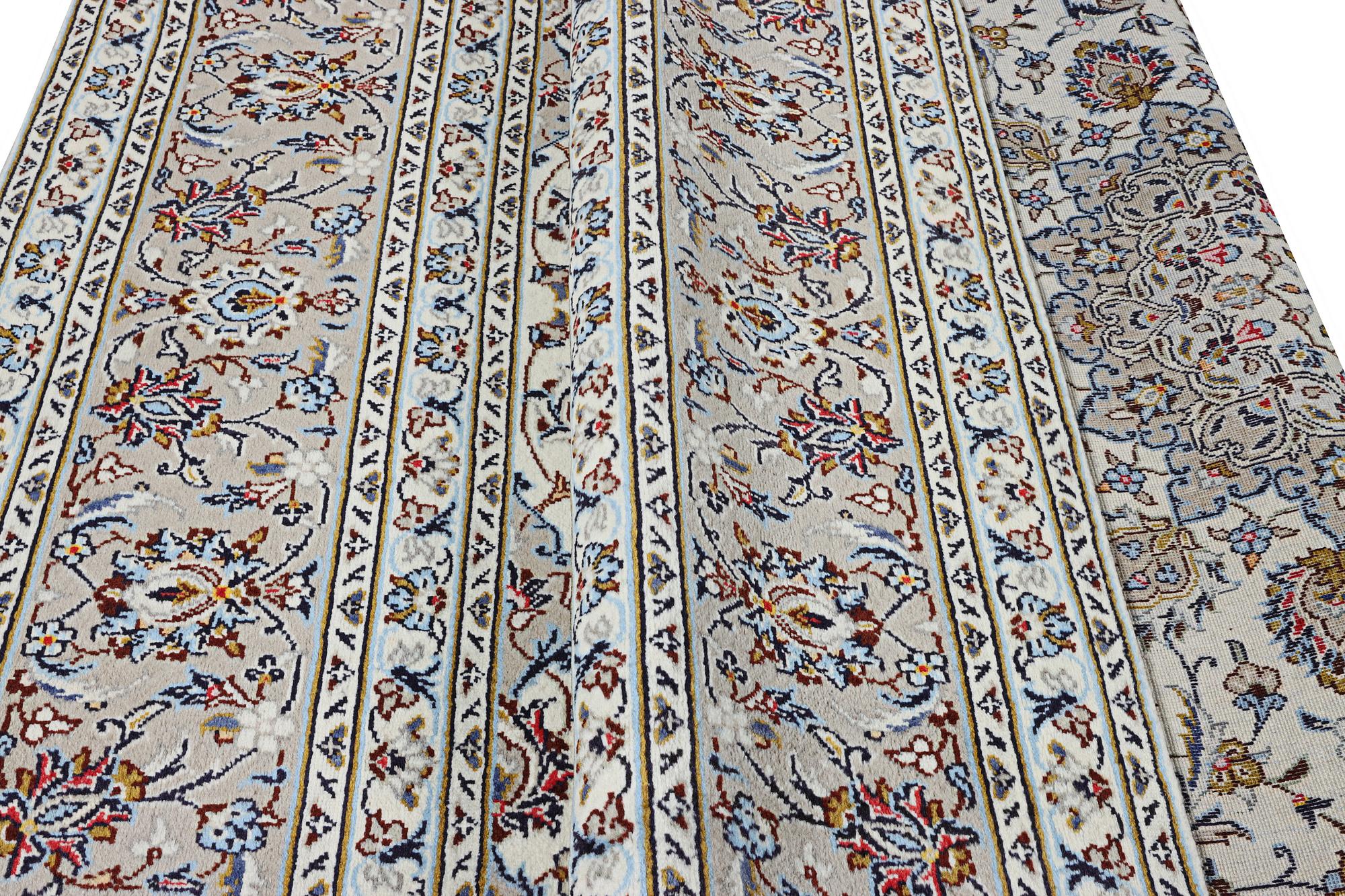 A Kashan carpet, c. 355 x 245 cm.