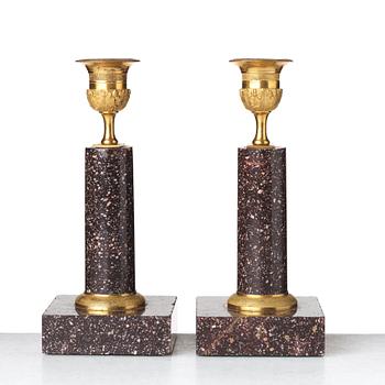 A pair of Swedish Empire candlesticks, early 19th century.