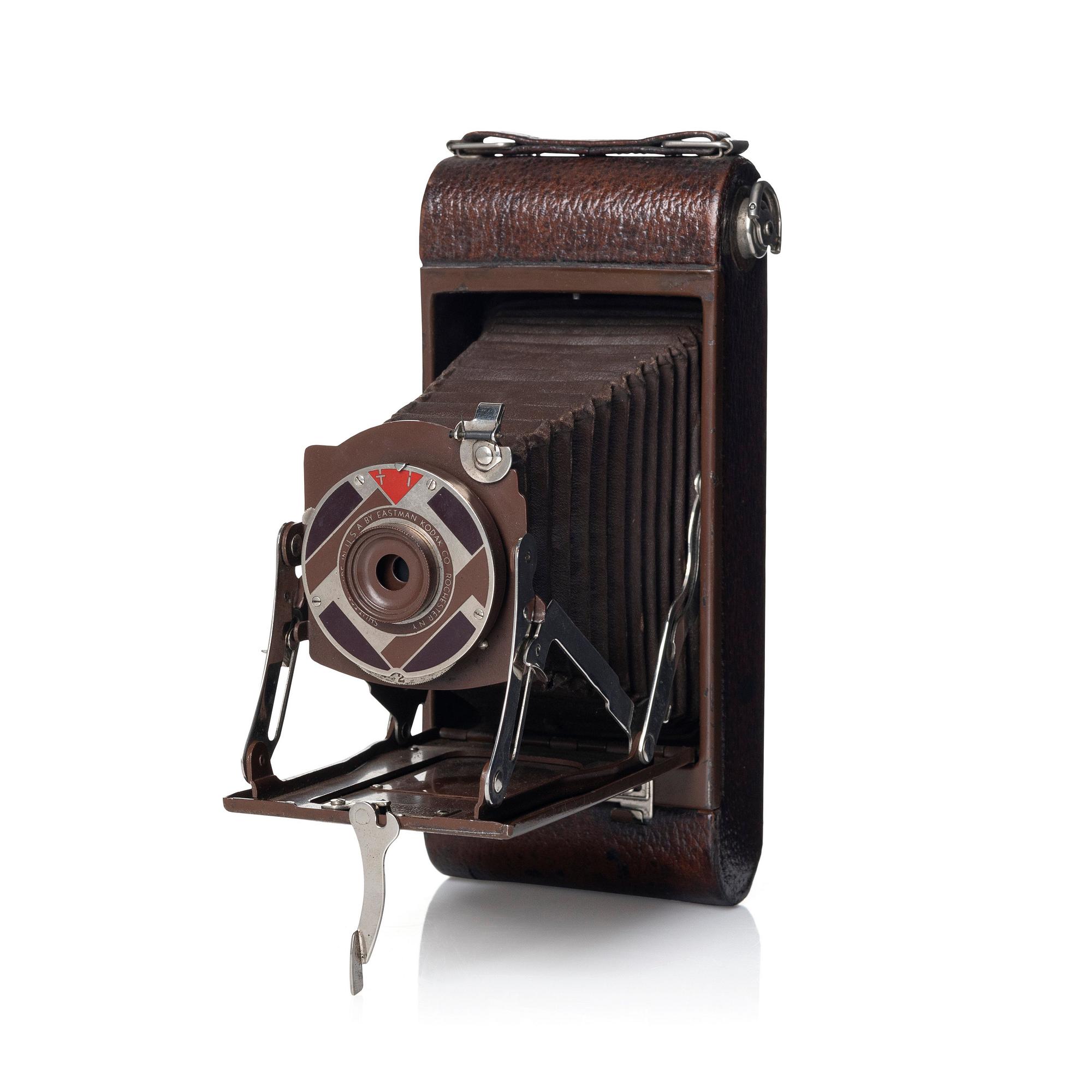 Walter Dorwin Teague, a folding camera in in a lacquered case, USA 1930s.