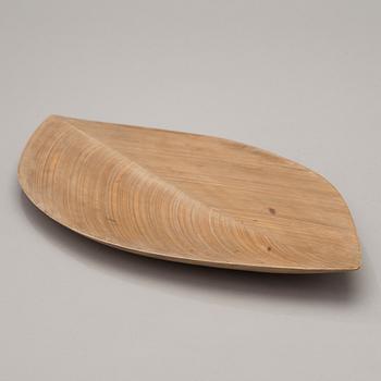 A 1950s plywood dish signed TW.