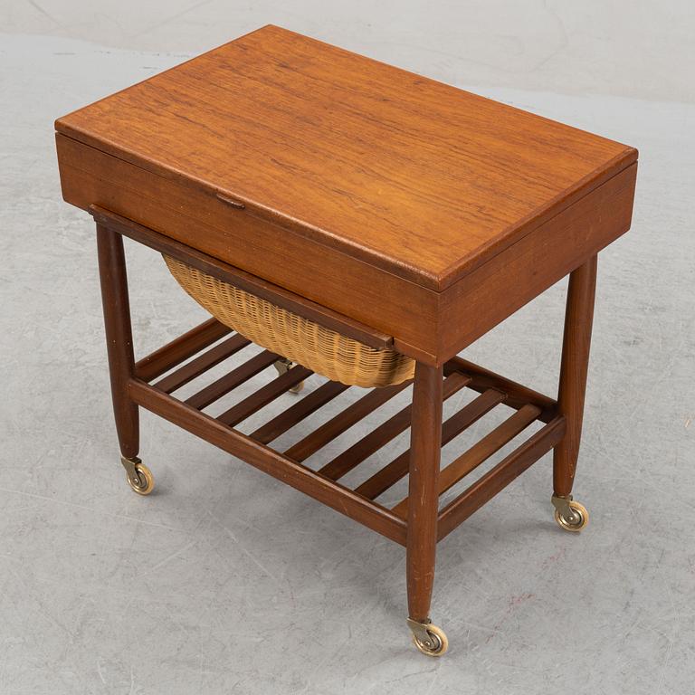 A teak veneered sewing table, 1950's/1960's.