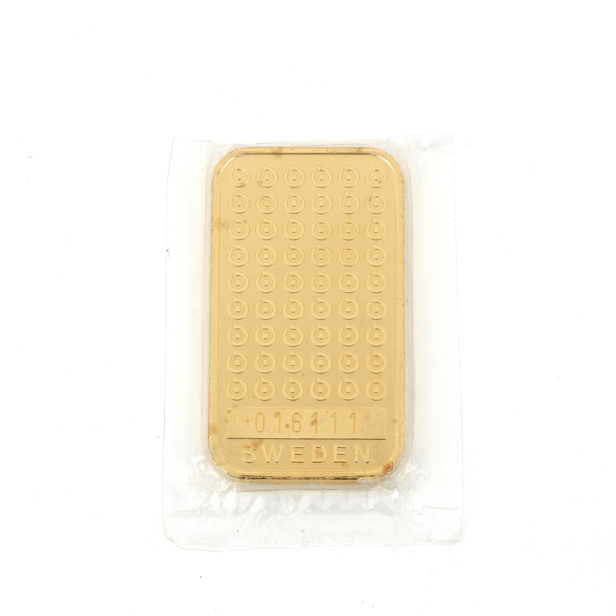 GULDTACKA, 24K guld, Boliden. Vikt 100g.
