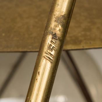 A mid-20th century wall light / table lamp, model EV 57 for Itsu, Finland.